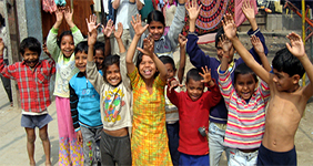 Children cheering during AYCS community program